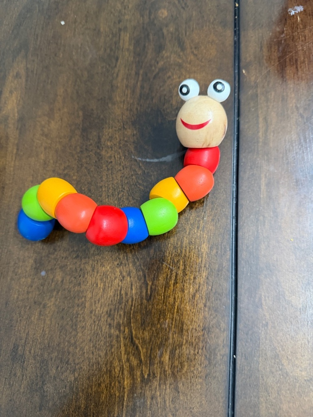 The very hungry caterpillar toddler book with Wooden Rainbow Caterpillar Toy